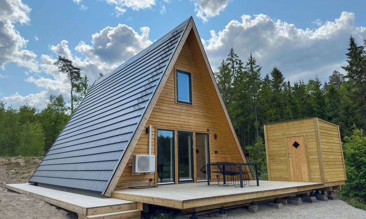 Tvetaryd House | A Frame cottage surrounded by a forest, incl sauna