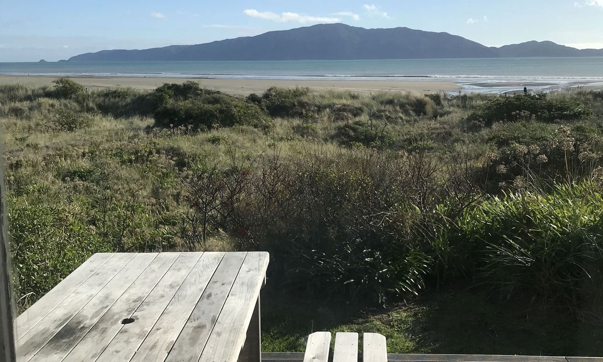 Waikanae House | Iconic absolute beachfront 60s bach