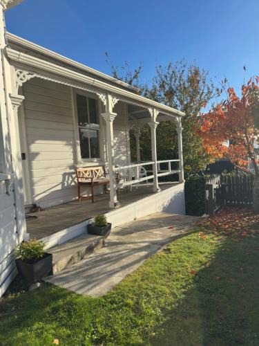 Nelson South House | Relaxing sunny Nelson retreat, balcony views & easy walk to CBD