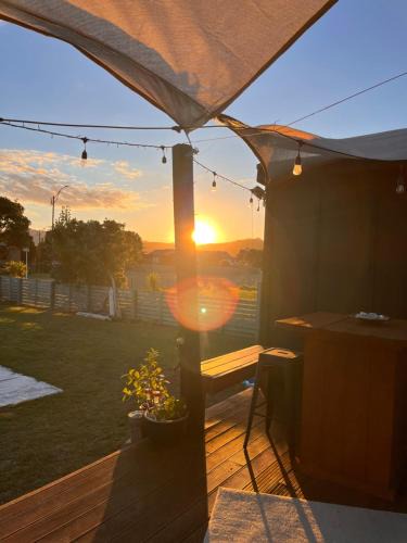 Matarangi House | Sunsets on Harbour Kauri or Totara Cabin