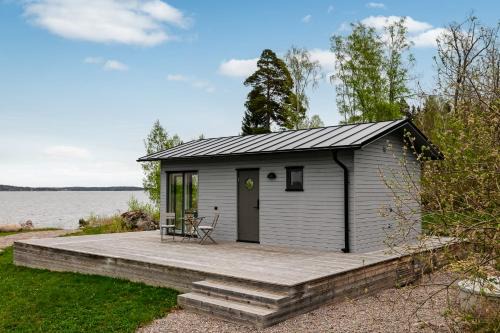 Resaro House | Waterfront home with private beach in Vaxholm