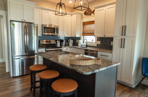 Sunset Beach House | 5 Star Sunset Beach canal home - Kayak, paddleboard, bring your boat & jetskis