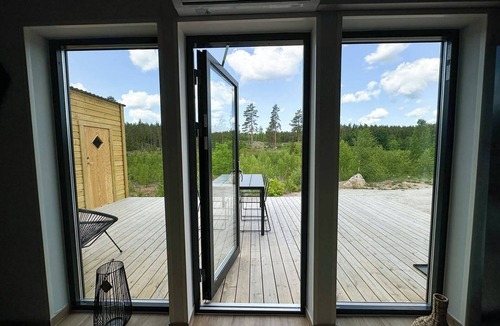 Tvetaryd House | A Frame cottage surrounded by a forest, incl sauna
