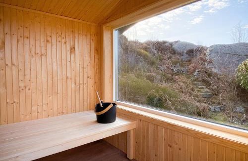Hjaelteby House | Architect-designed villa with pool, sauna and sea view in Mjörn SE09124