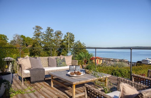 Taby Villa | Architectural Waterfront Villa with Pool & Sauna