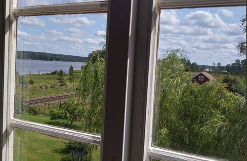 Vimmerby Municipality House | Charming red and white holiday home with lake view near Vimmerby