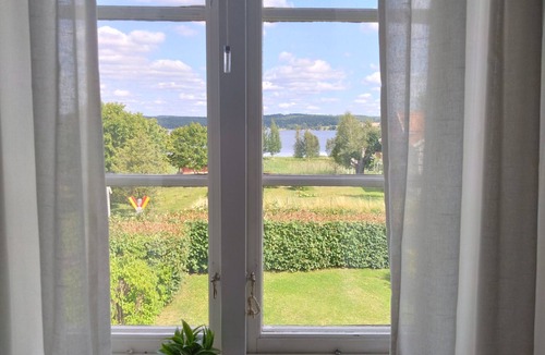 Vimmerby Municipality House | Charming red and white holiday home with lake view near Vimmerby
