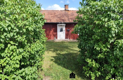Vaderstad House | Charming red cottage in Vaderstad SE10024