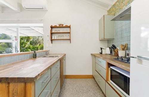 Whangaripo House | Chic Converted Barn in Matakana with Spa