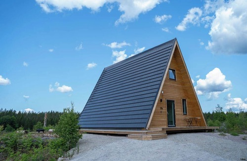 Tvetaryd House | Cozy A-frame cottage surrounded by a magical panorama, incl sauna
