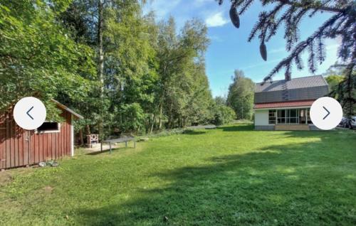 Vislanda Villa | Grå villa