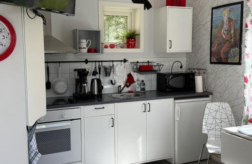 Ljungskile House | Grottstugan