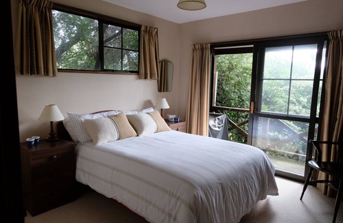 Akaroa House | Harbour-view haven - with a large garden.