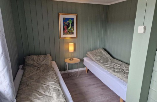 Vadso House | Huset på øya