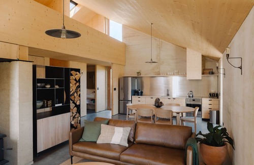 Kawarau Falls House | Jacks Point Earth House, Mountain View & Fireplace