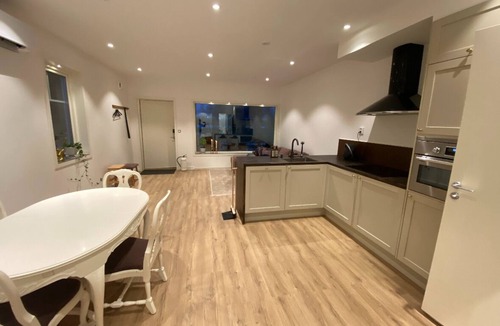 Karlsborg Apartment | Modern apartment with lake view & sauna