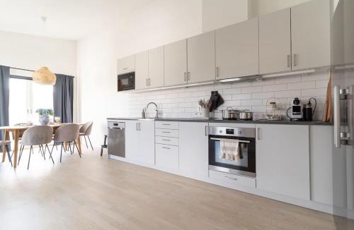 Bastad House | Modern Beachy Home with Terrace Charm First Floor