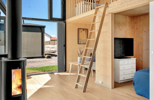 Nes Municipality House | Modern comforts and river views at Oppaker