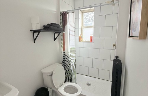 East Avenue Apartment | Modern studio in Downtown Rochester with a full kitchen and Smart TV, steps from High Falls.
