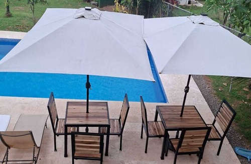 Hatillo House | Moody's Huts. Charming 1-bedroom container unit with AC in peaceful Savegre