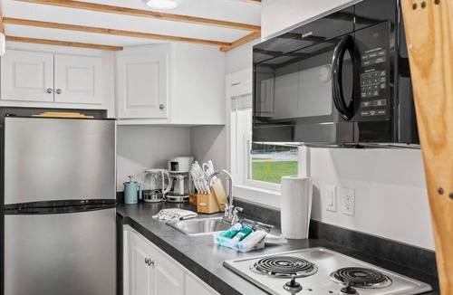 Sylva House | River Run, Riverfront Tiny Home, Trails, and Views