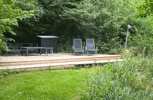 Tomelilla House | Skogsbäckens stugby AB