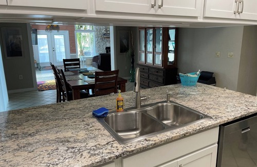 Indian Waters House | Spacious 3 BR 2 Bath House On Deep Canal With Screened Heated Pool
