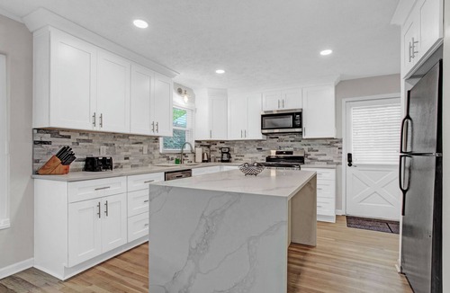 Lilburn House | Spacious 3-level Fun House Pool HotTub Theater GameRoom BBQ