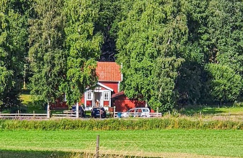 Aneby House | Surrounded by idyllic nature and many lakes, this cozy vacation home in Aneby welcomes you.