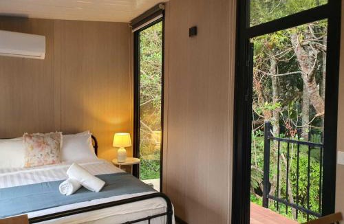 Waitoki House | The Kauri Retreat by Tiny Away