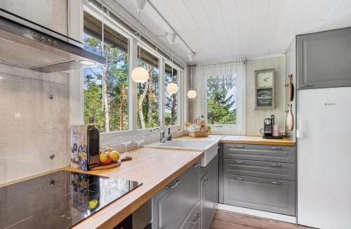 Moss House | Trekanthytte