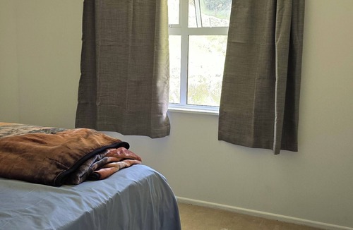 Te Anga House | Unique sunny space in natural setting. A lovely house & private access to river.