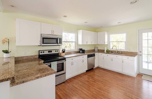Braden River House | Waterfront 4BR w/Game Room Near UTC & IMG Sleeps 12