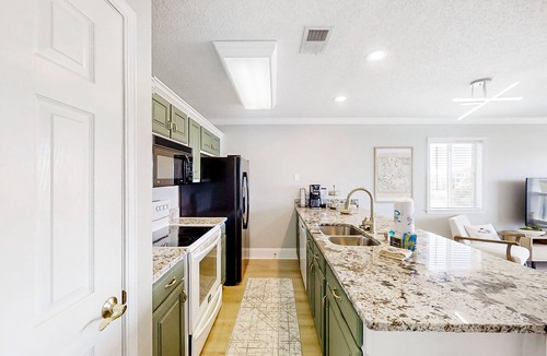 Carolina Yacht Landing Condo | Waterfront condo w/private balcony, shared pool, hot tub & A/C
