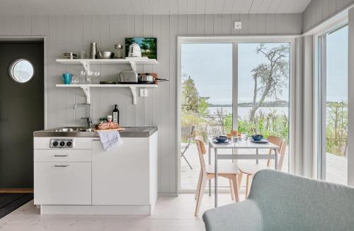 Resaro House | Waterfront home with private beach in Vaxholm