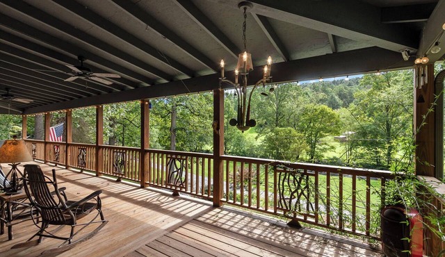 BEAUTIFUL SETTING - RIVER FRONT W/FIRE PIT!