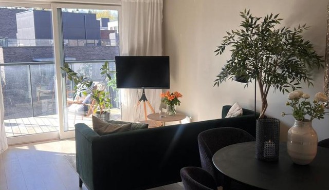 Bright, stylish apartment with a sunny balcony close to nature