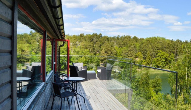 Enjoy relaxing baths in the jacuzzi with sea view in this vacation home.