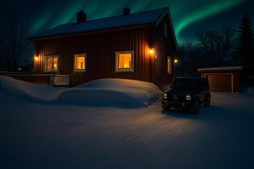 House in the lights and Aurora