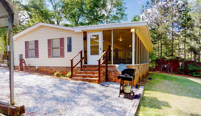 Secluded, waterfront home w/ a large yard, private dock, & water access!
