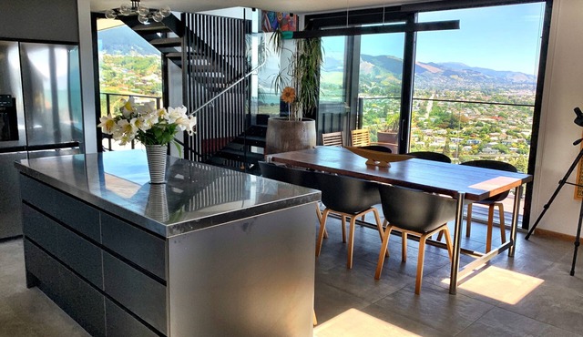 Stunning views, all-day sun, modern light filled home in a top Nelson area!