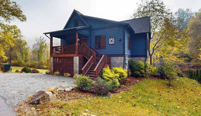 Take in the natural beauty from this elegant riverfront home