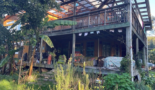 The Big House, a sanctuary in a lush valley bordering the Abel Tasman NP.