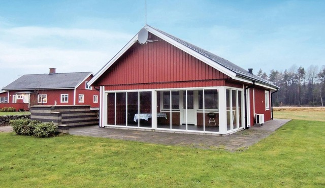 This modern vacation home offers a high standard and is situated on a large, almost park-like plot i