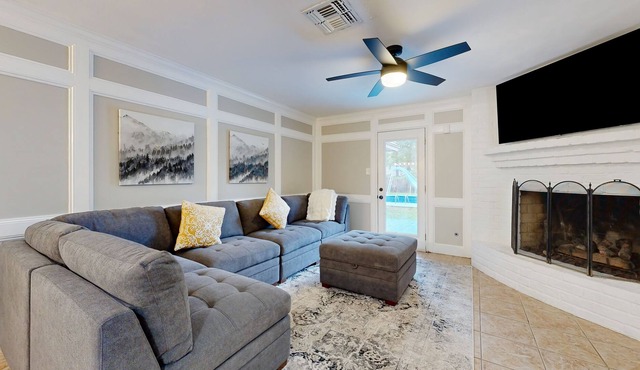 Tree-lined property with pool, bikes, gas fireplace, & separate casita - dogs ok
